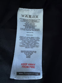Just Casual Lyle & Scott Pflegeetikett mit Waschanleitung und Materialangaben aus 100% Baumwolle
